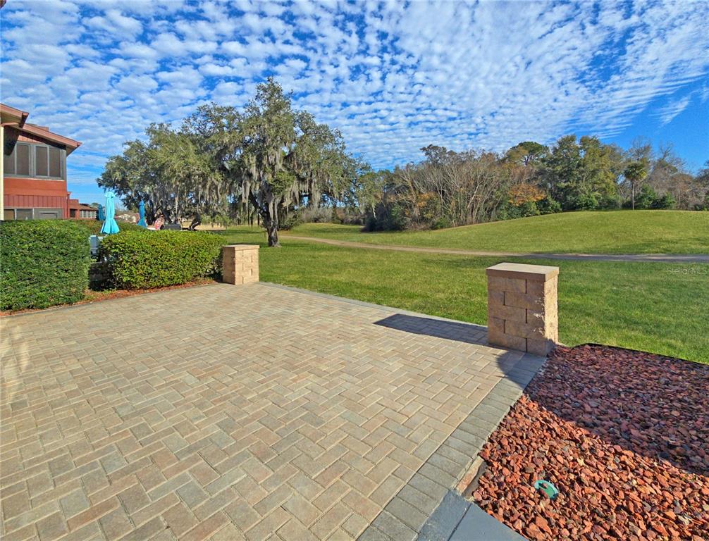 680 Midway Drive, Unit A Ocala, FL 34472 - Photo 29 of 39 a view of a garden with an outdoor space