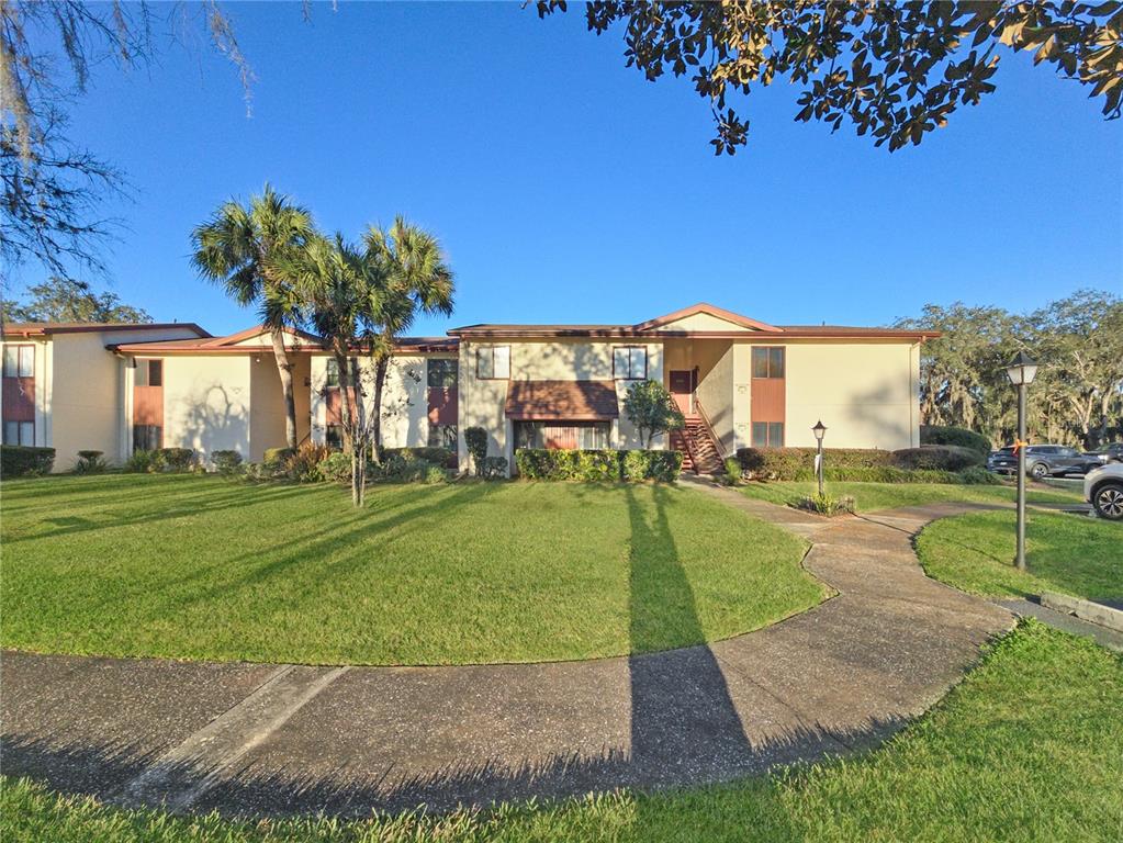680 Midway Drive, Unit A Ocala, FL 34472 - Photo 3 of 39 a view of a park with large trees