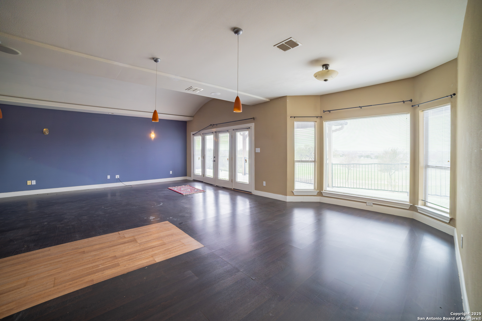 12219 Course View Drive San Antonio, TX 78221 - Photo 13 of 29 a view of an empty room with wooden floor and a window