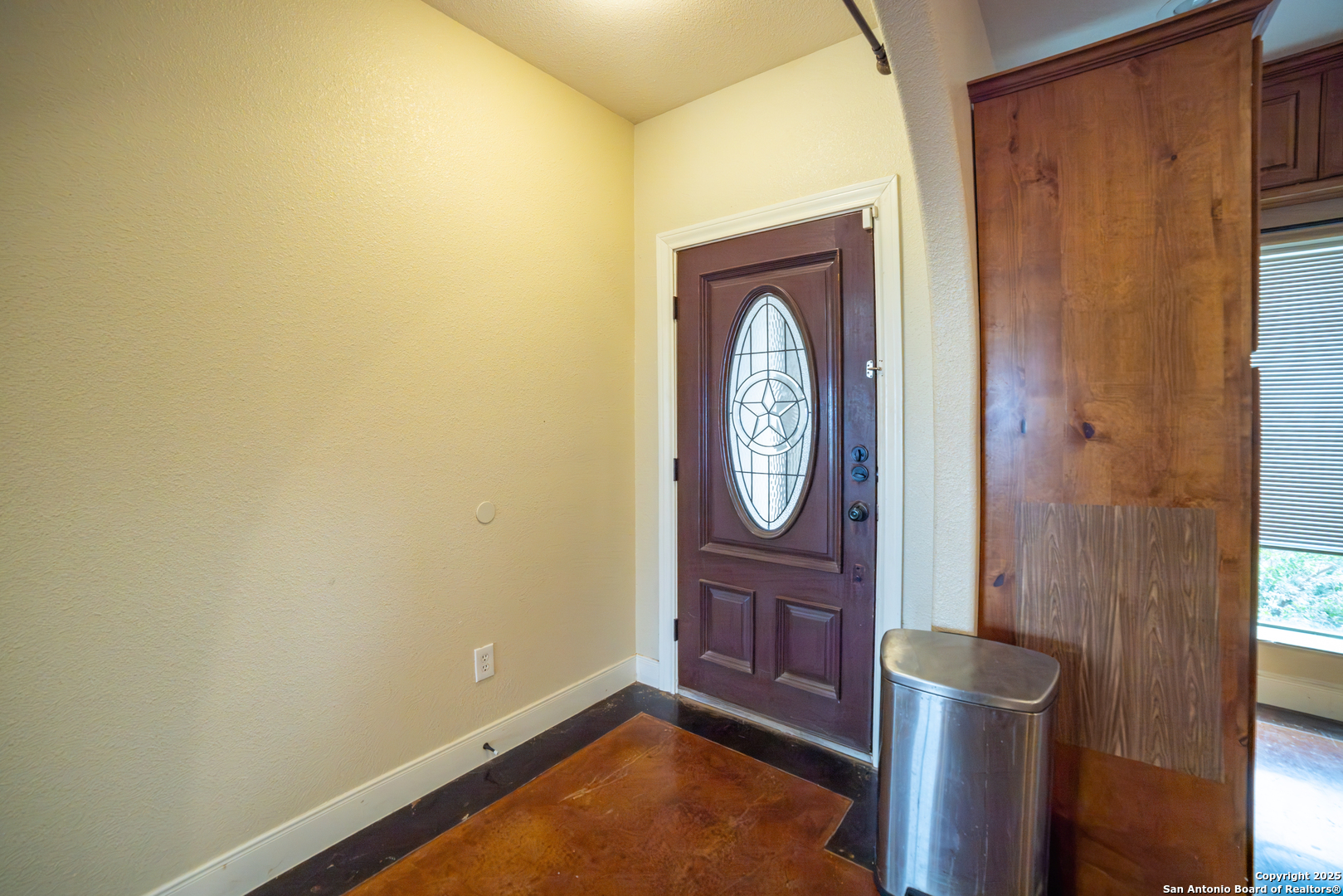 12219 Course View Drive San Antonio, TX 78221 - Photo 2 of 29 a wooden door in a room