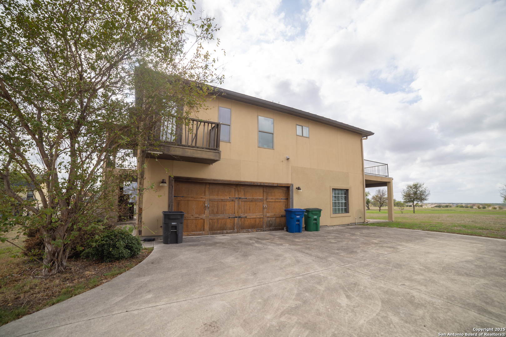 12219 Course View Drive San Antonio, TX 78221 - Photo 27 of 29 a view of a house with a yard