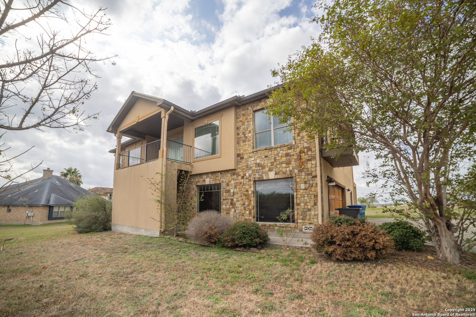 12219 Course View Drive San Antonio, TX 78221 - Photo 28 of 29 a front view of a house with plants