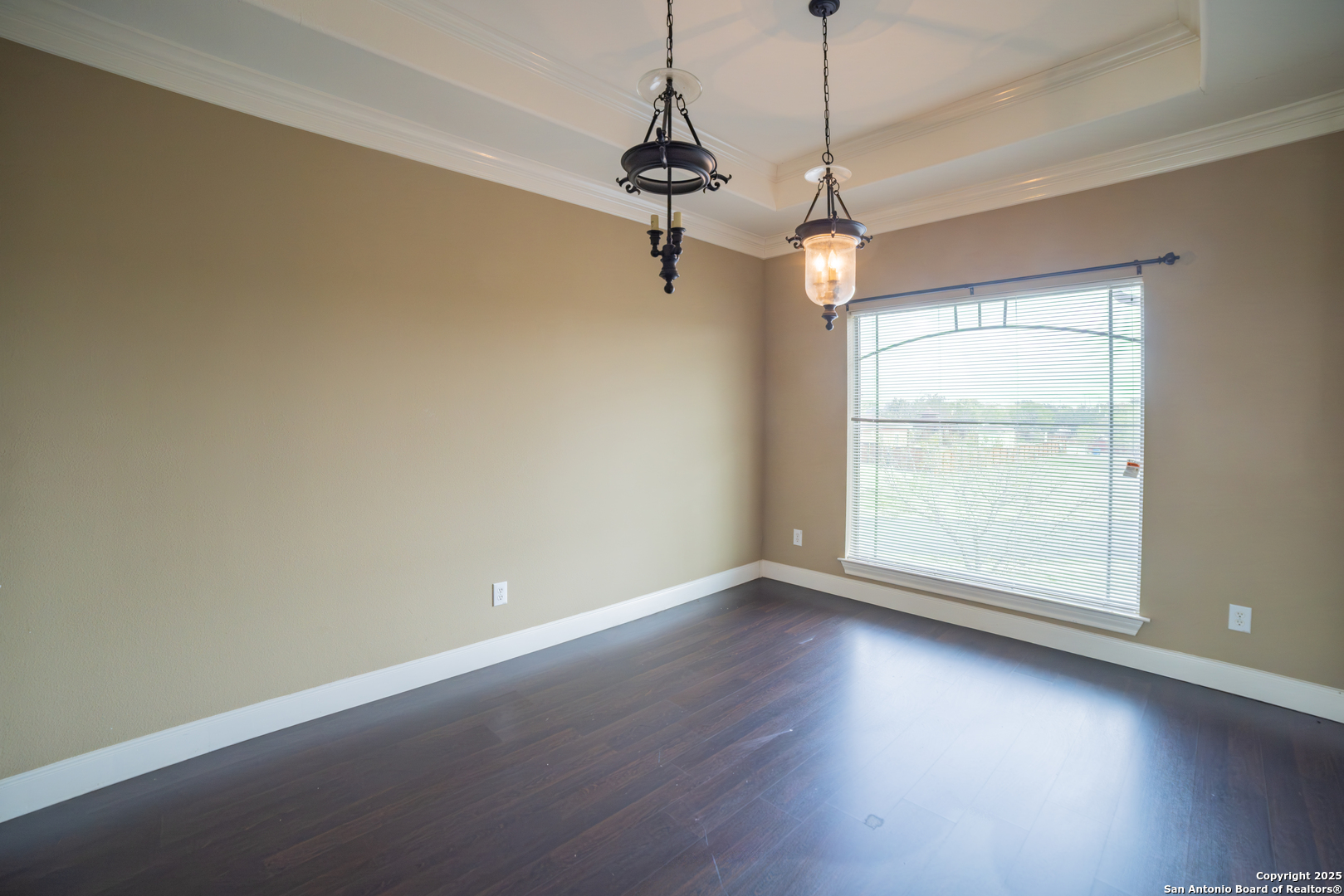 12219 Course View Drive San Antonio, TX 78221 - Photo 10 of 29 a view of a room with wooden floor windows and cabinet
