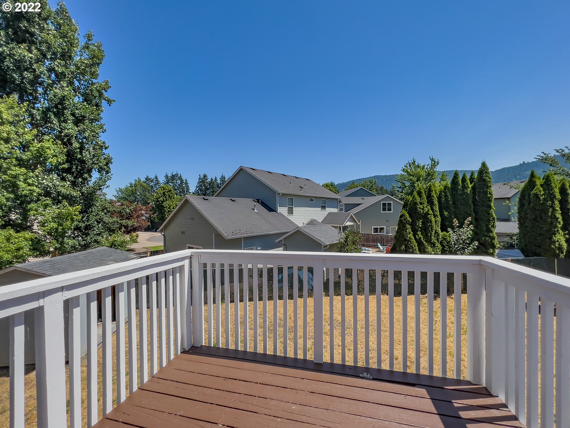 635 71st Street Springfield, OR 97478 - Photo 14 of 31 a view of balcony with wooden floor and fence