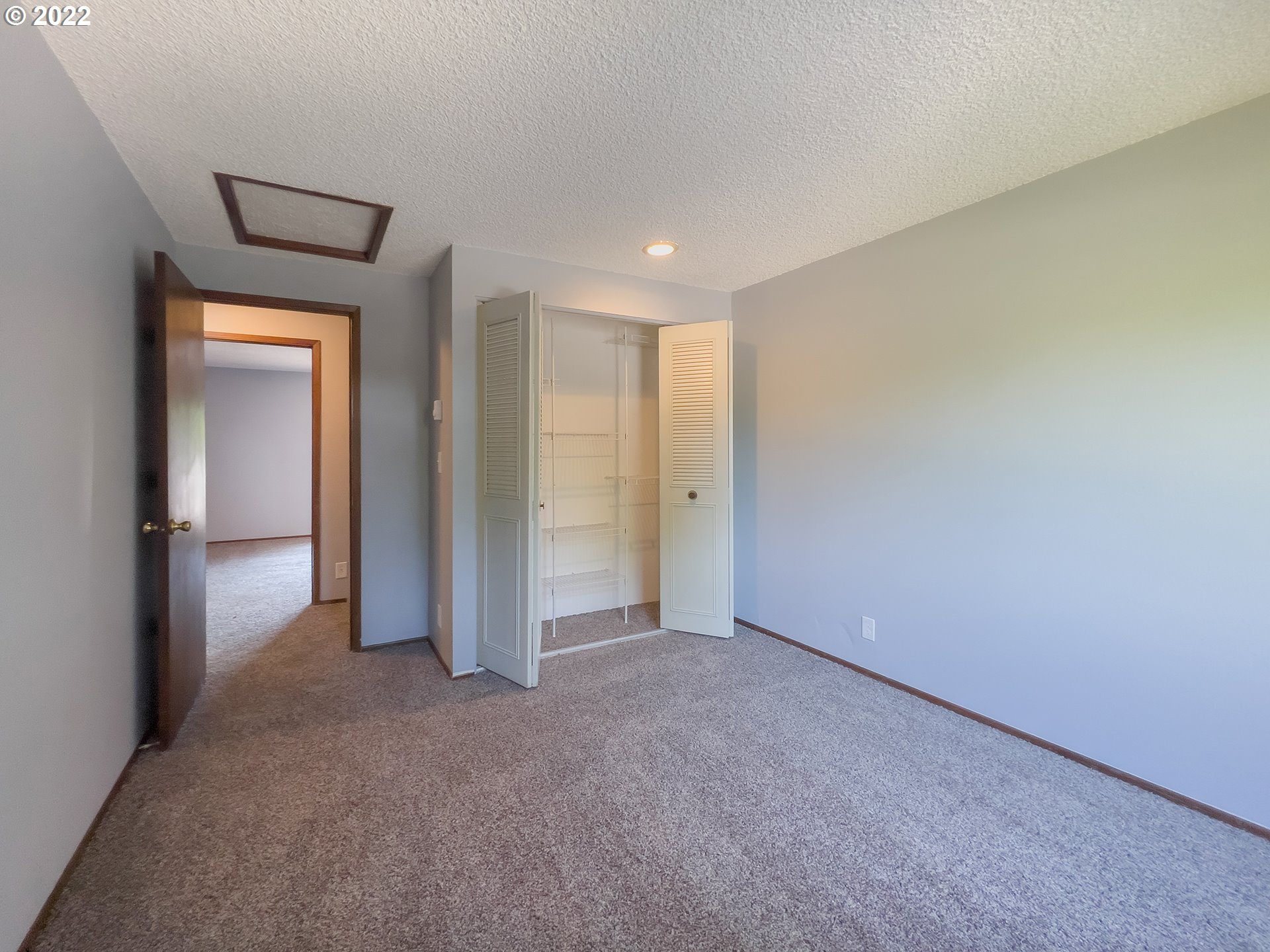 635 71st Street Springfield, OR 97478 - Photo 18 of 31 a view of an empty room and a gallery