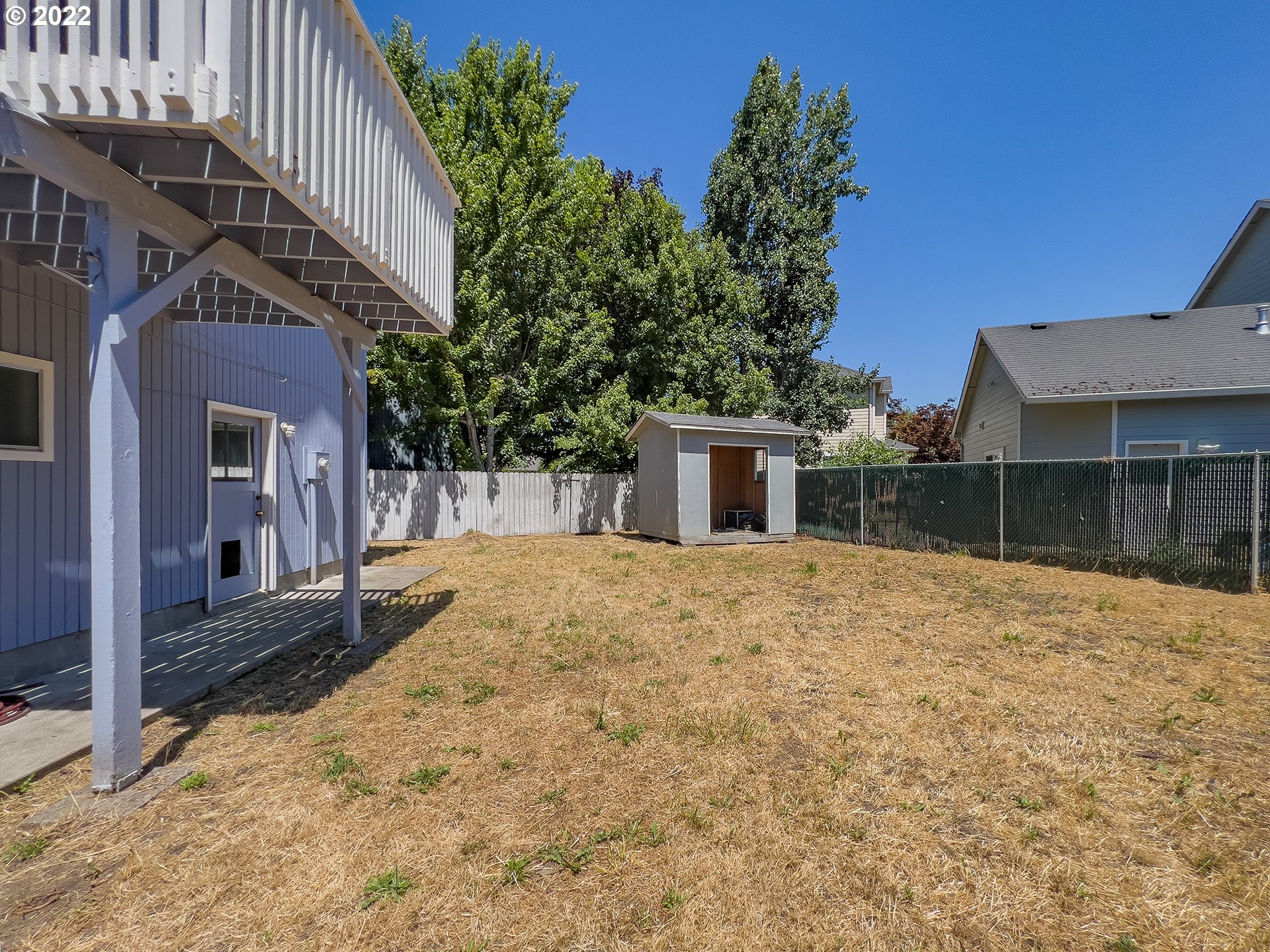 635 71st Street Springfield, OR 97478 - Photo 24 of 31 a front view of a house with a yard