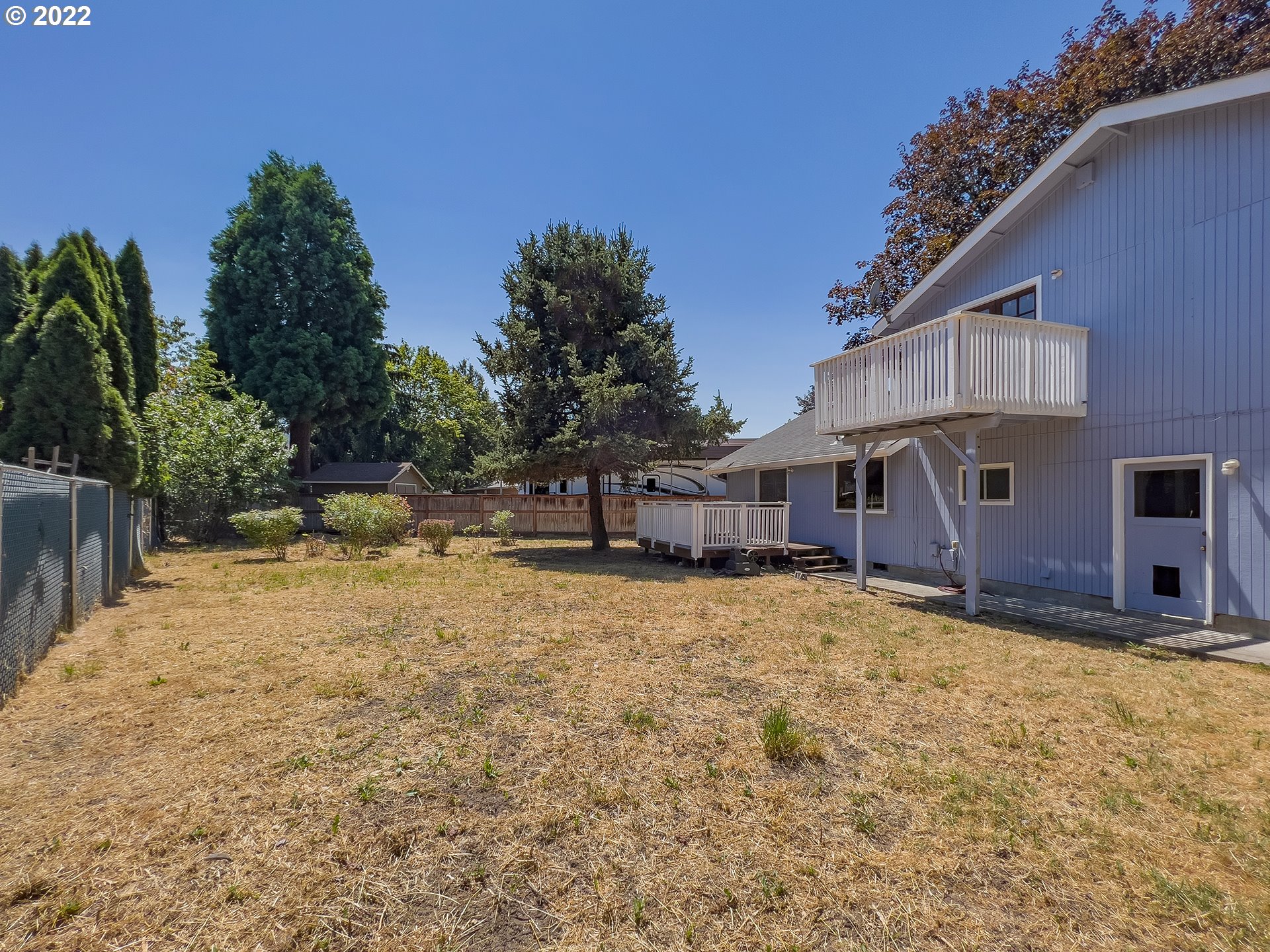635 71st Street Springfield, OR 97478 - Photo 27 of 31 a view of a house with a yard