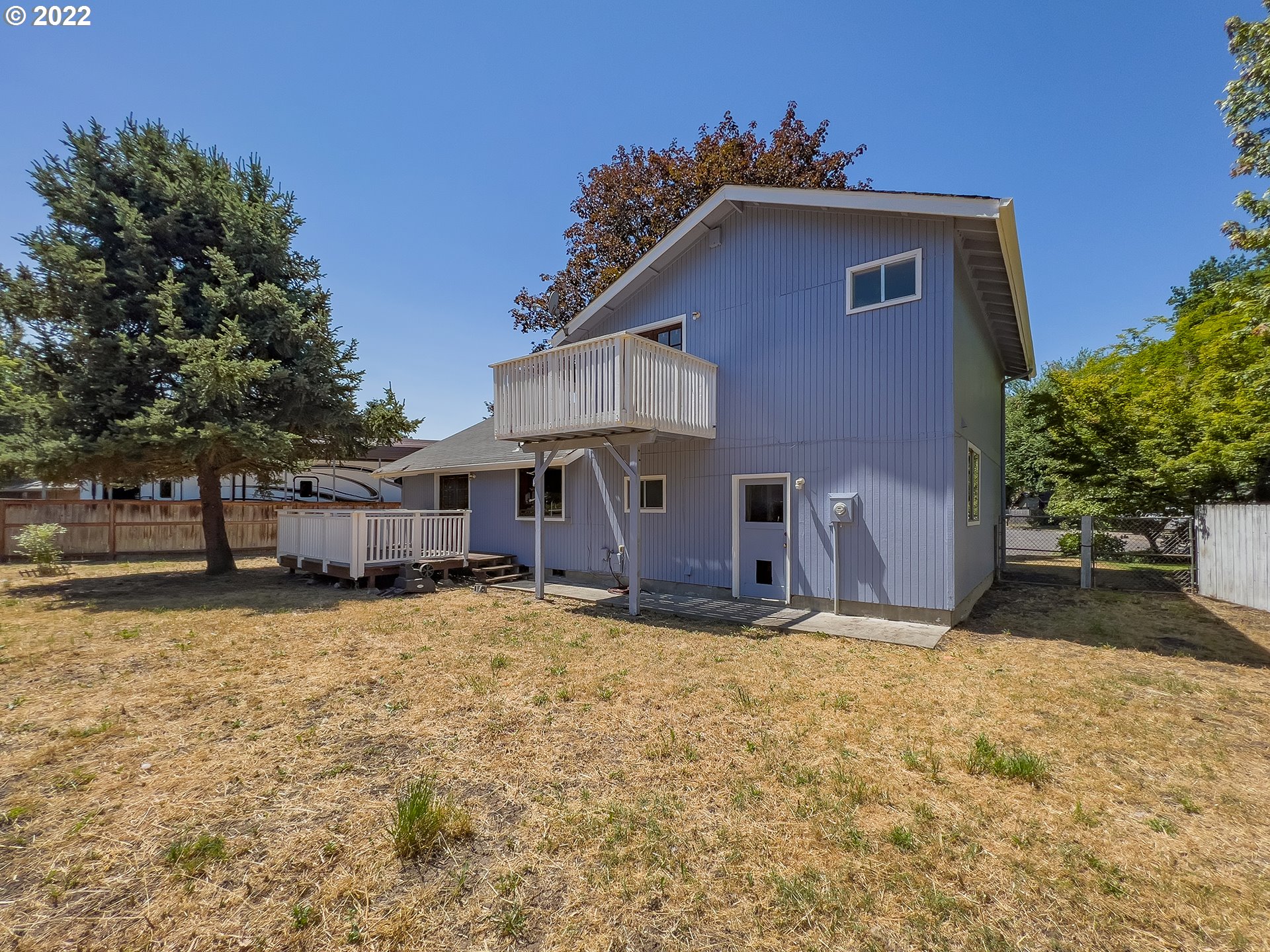 635 71st Street Springfield, OR 97478 - Photo 28 of 31 a view of a house with a yard