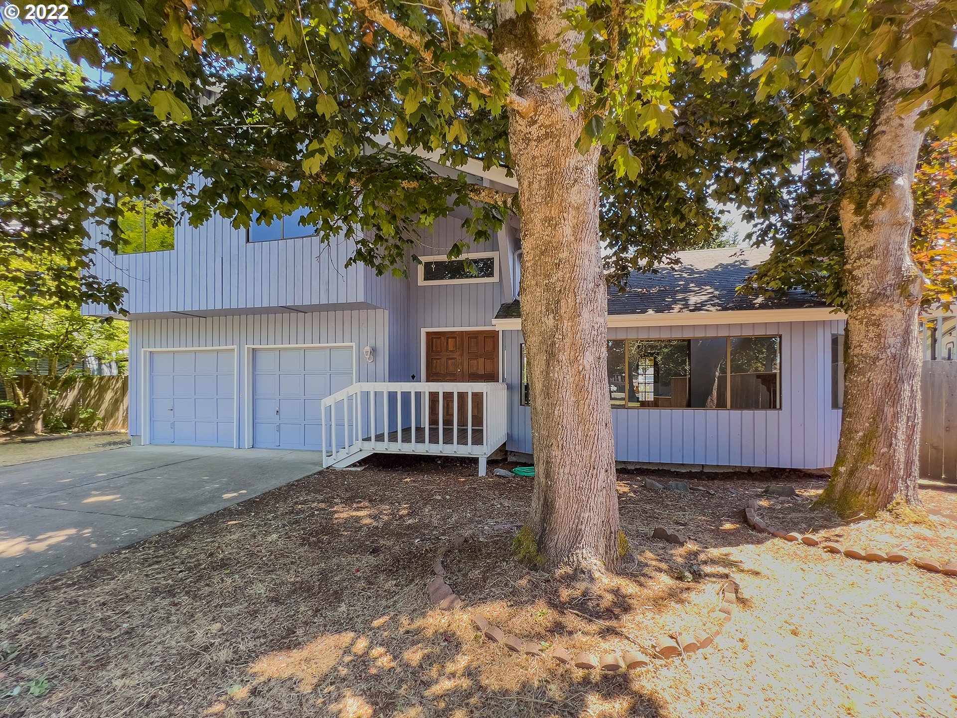 635 71st Street Springfield, OR 97478 - Photo 31 of 31 a view of a house with a yard and large tree