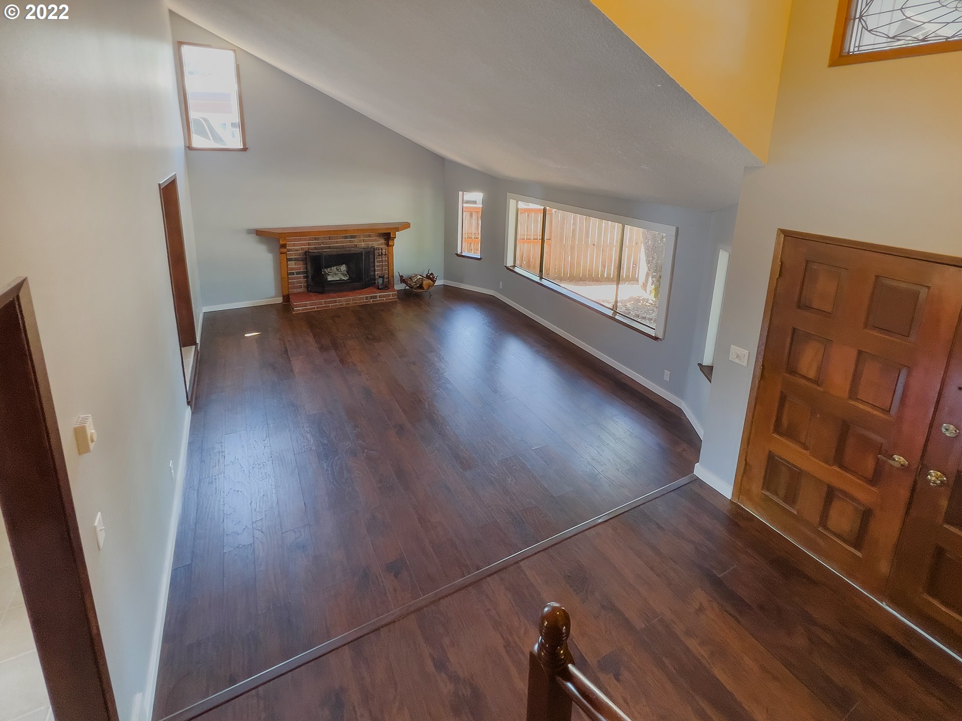 635 71st Street Springfield, OR 97478 - Photo 4 of 31 a view of an empty room with wooden floor and a window