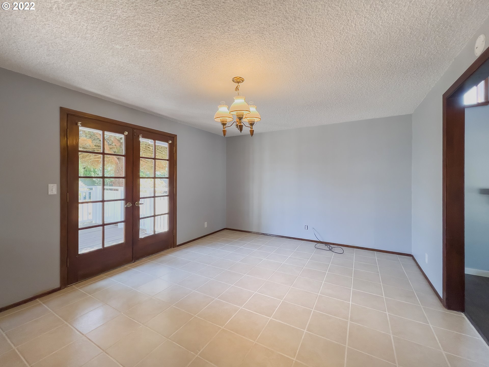 635 71st Street Springfield, OR 97478 - Photo 9 of 31 wooden floor in an empty room with a window
