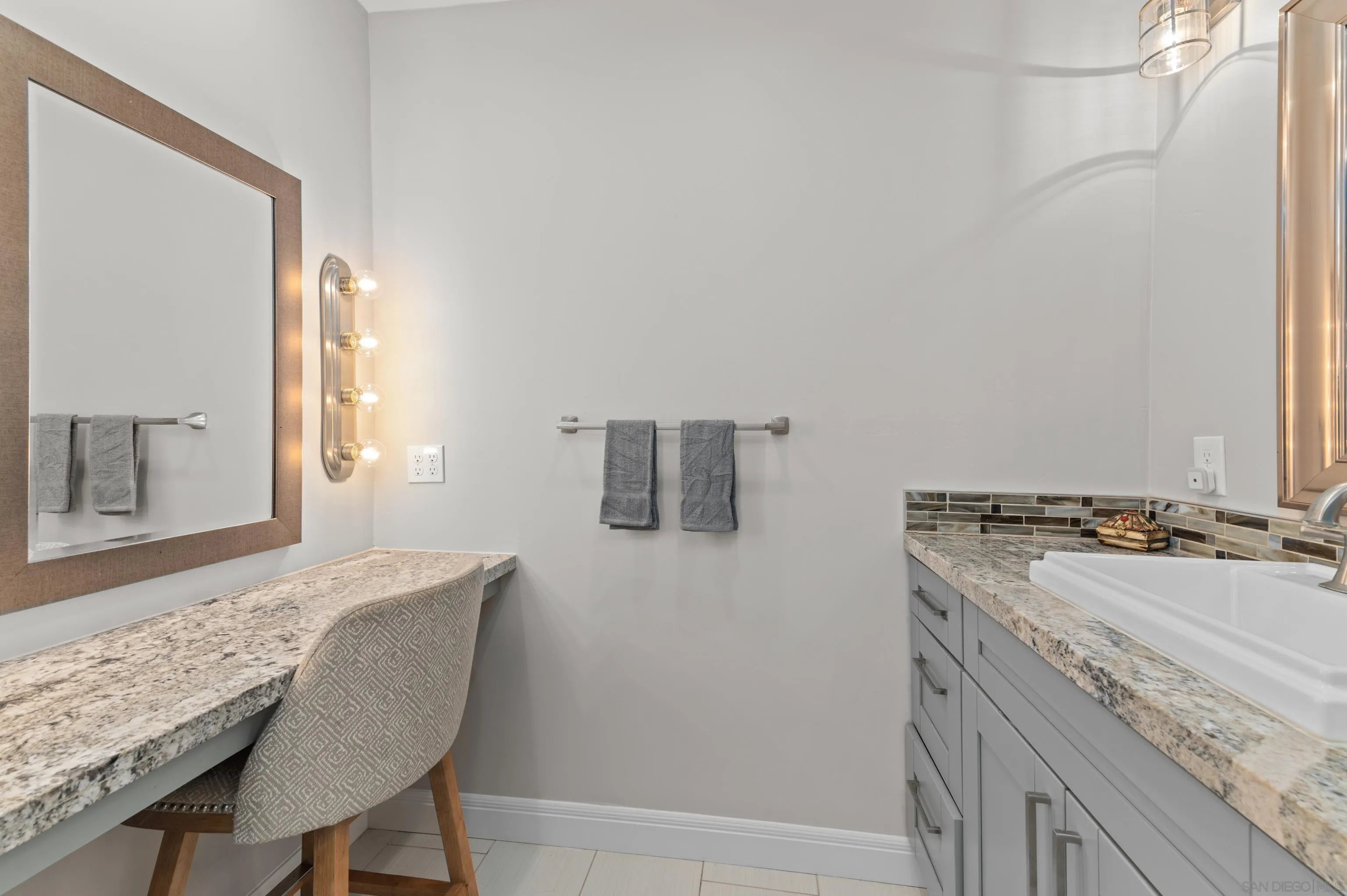 2950 Olive View Road Alpine, CA 91901 - Photo 12 of 29 a bathroom with a granite countertop sink a mirror and a toilet