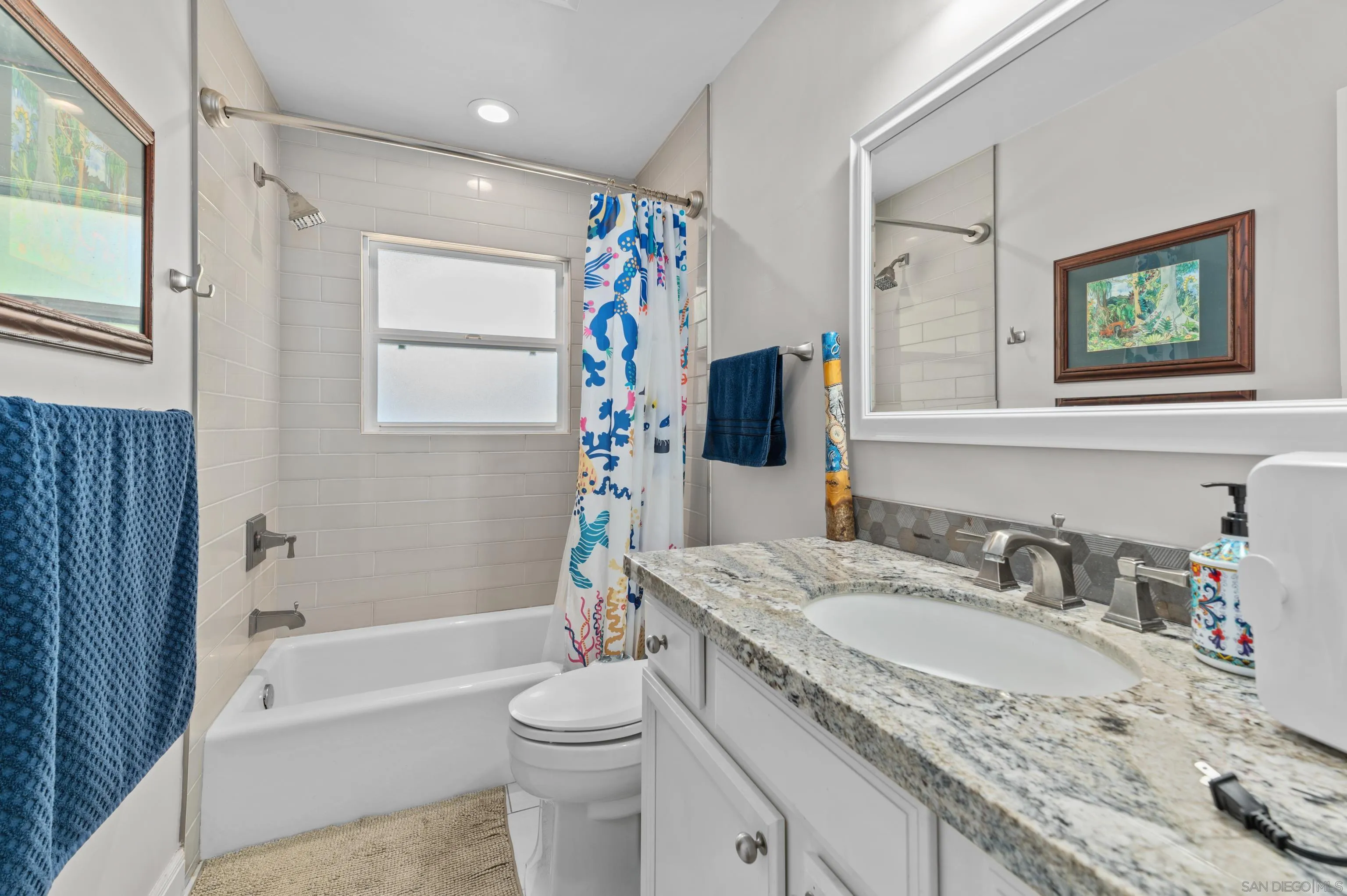 2950 Olive View Road Alpine, CA 91901 - Photo 14 of 29 a bathroom with a granite countertop sink toilet and shower