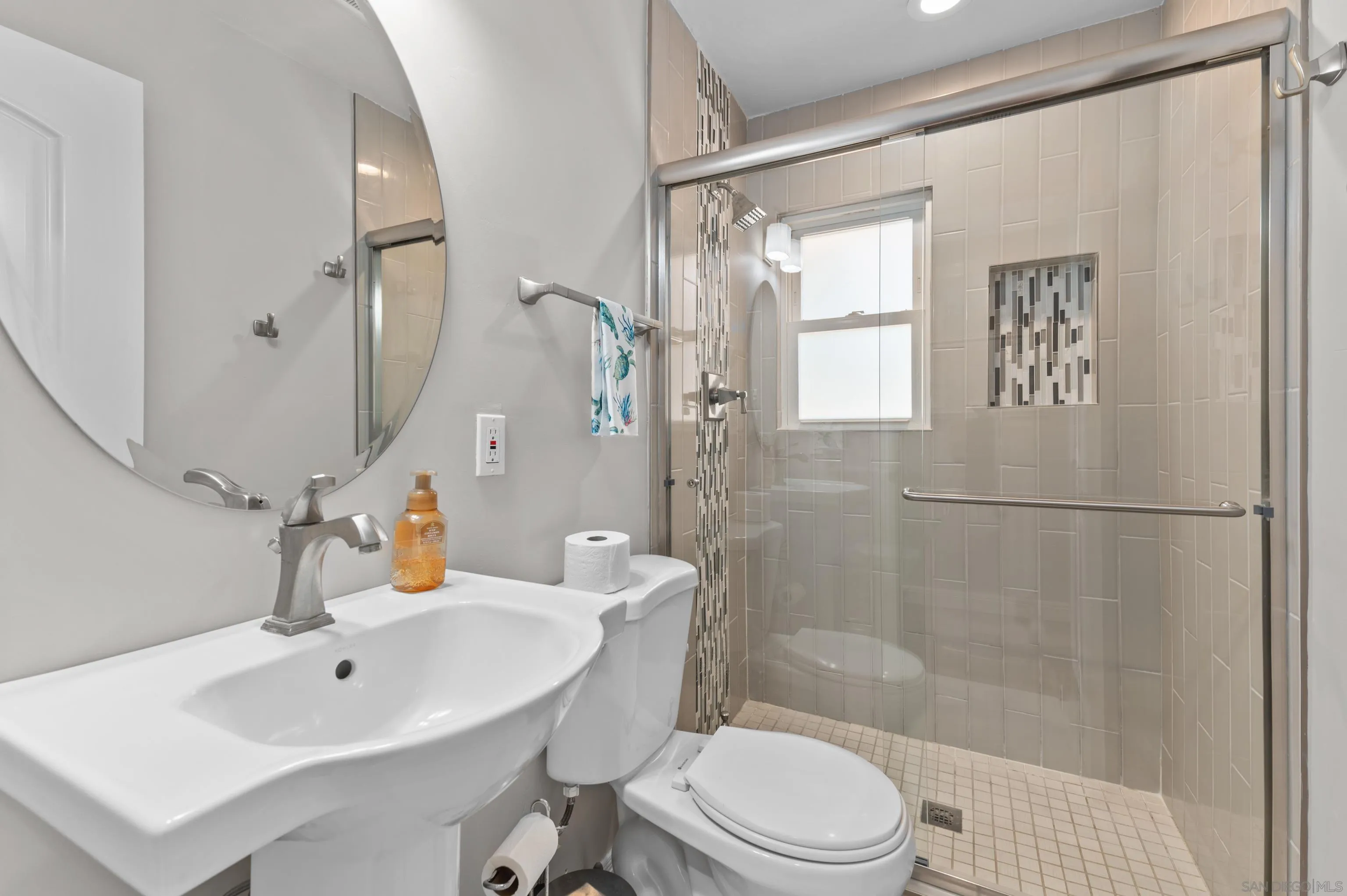 2950 Olive View Road Alpine, CA 91901 - Photo 16 of 29 a bathroom with a sink a toilet and shower