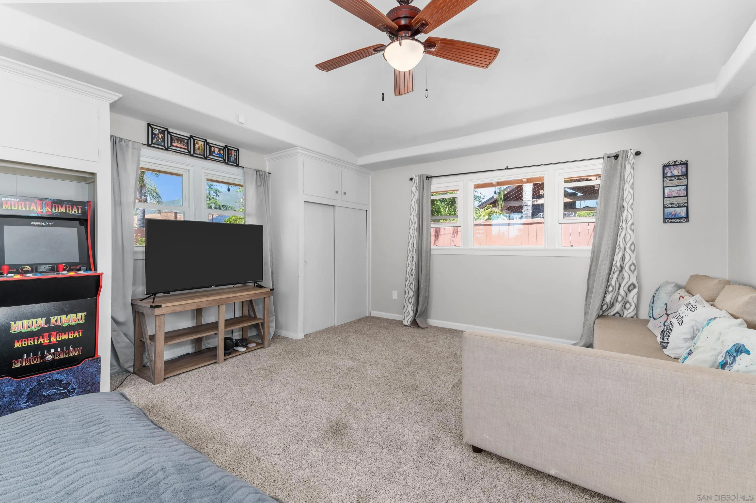 2950 Olive View Road Alpine, CA 91901 - Photo 22 of 29 a living room with furniture and a flat screen tv