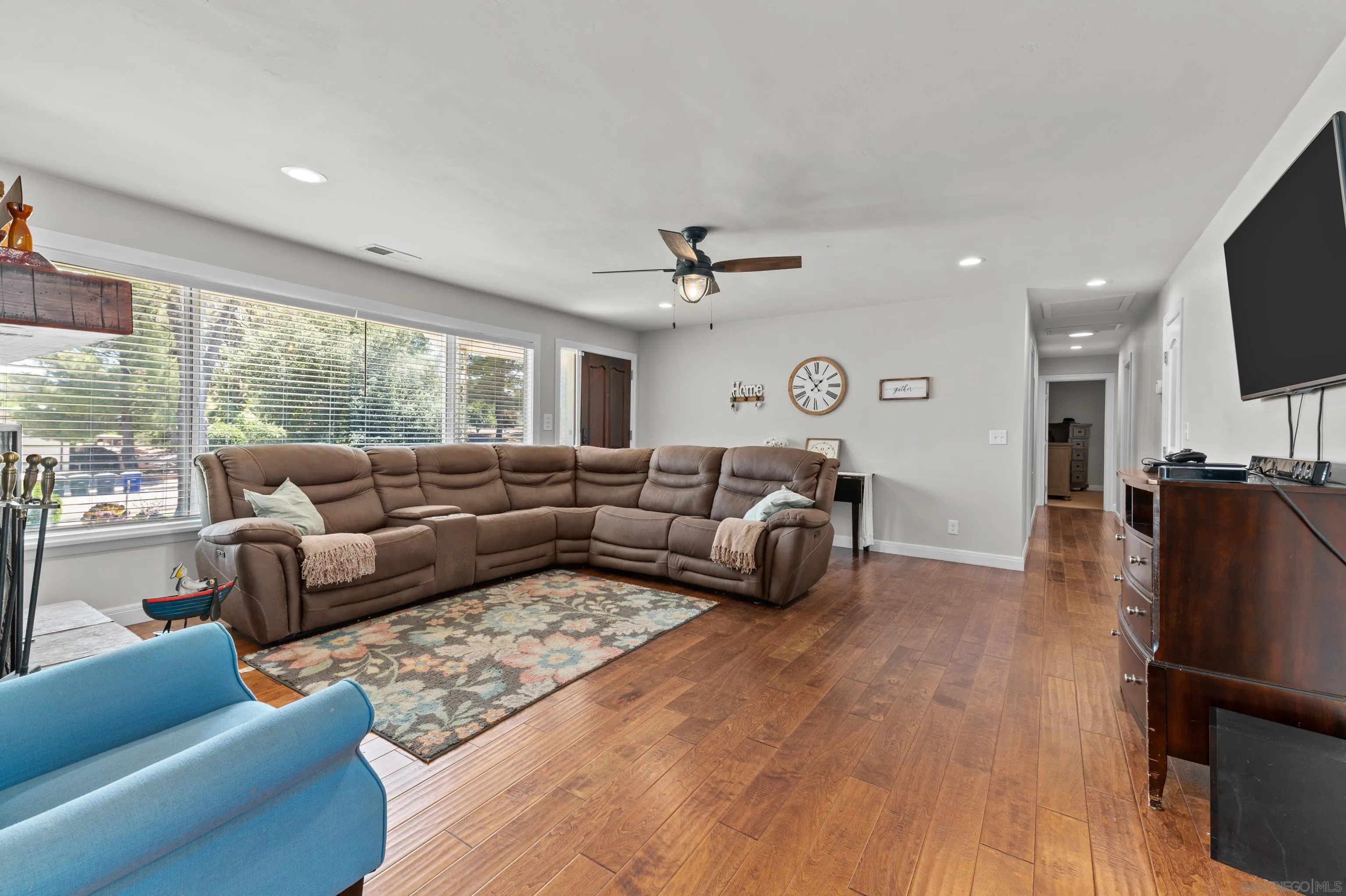 2950 Olive View Road Alpine, CA 91901 - Photo 5 of 29 a living room with furniture ceiling fan and a large window