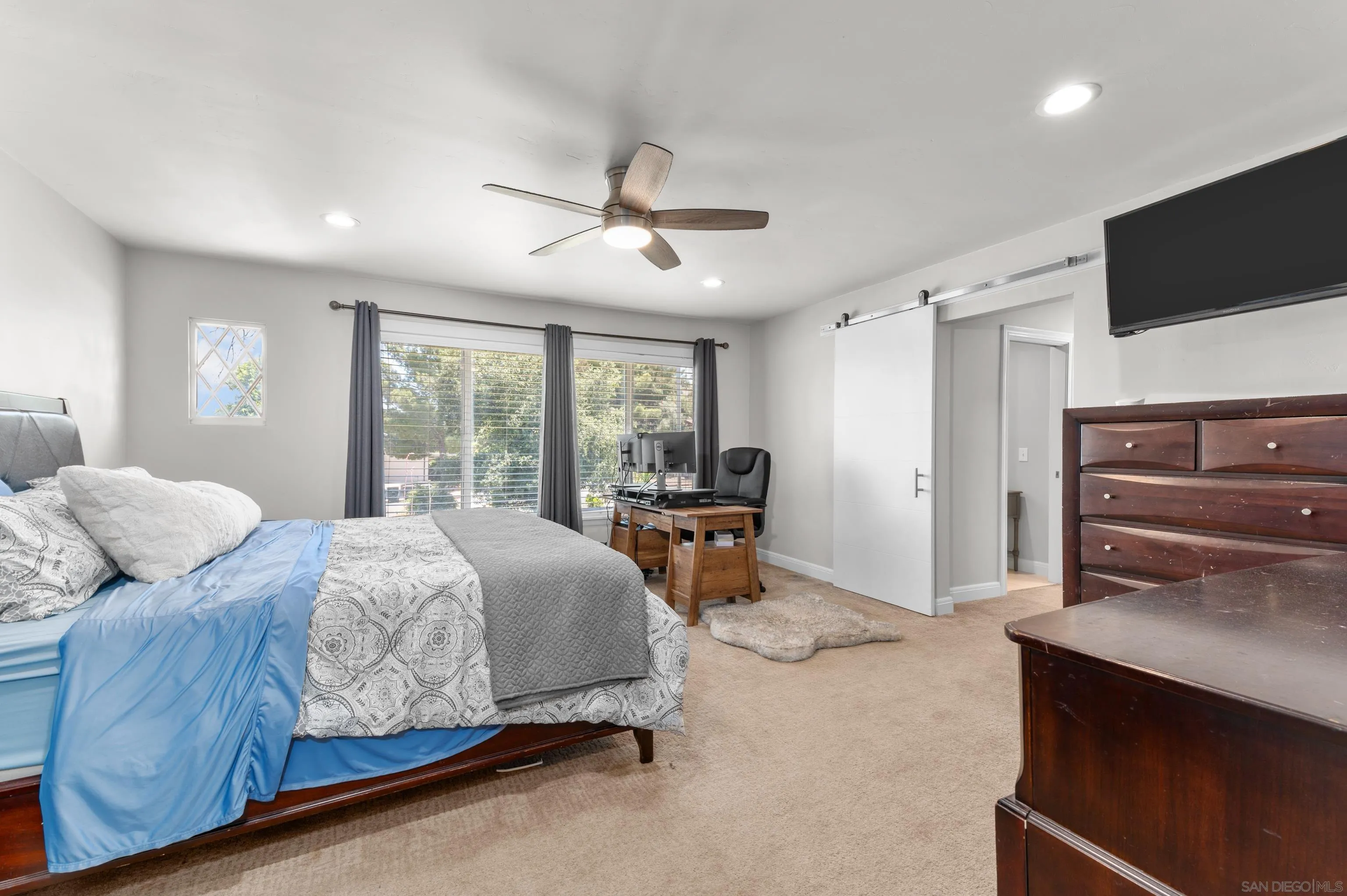 2950 Olive View Road Alpine, CA 91901 - Photo 8 of 29 a spacious bedroom with a bed and large windows