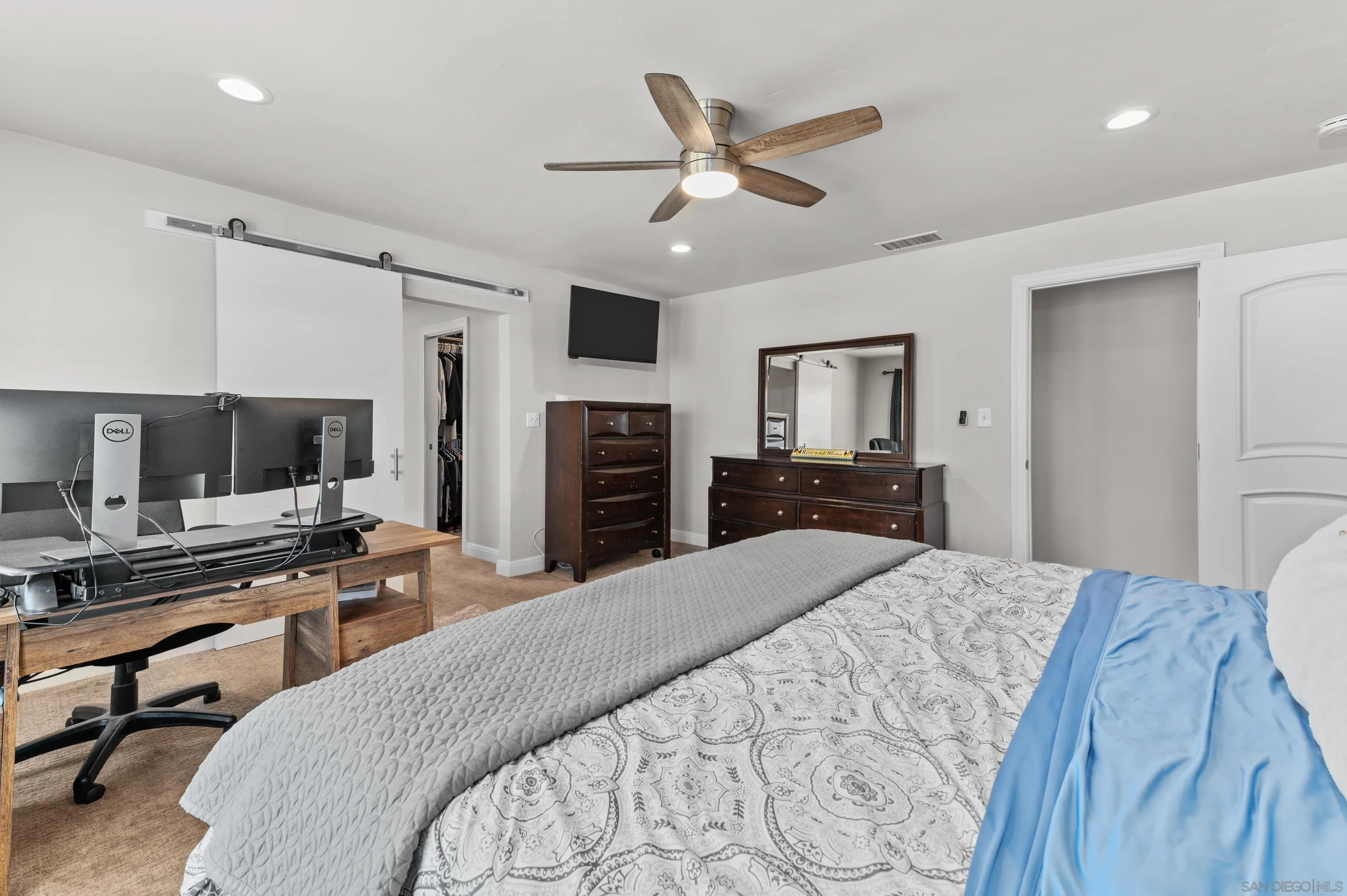 2950 Olive View Road Alpine, CA 91901 - Photo 9 of 29 a bedroom with a bed and a flat screen tv