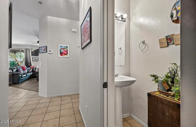 a view of a hallway and dining room