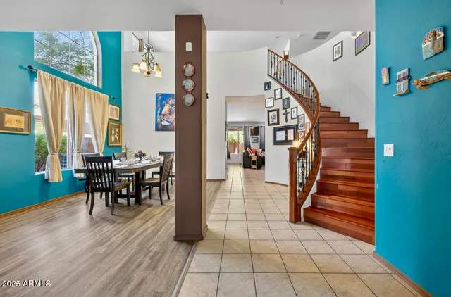 a view of a dining room with furniture window and entryway