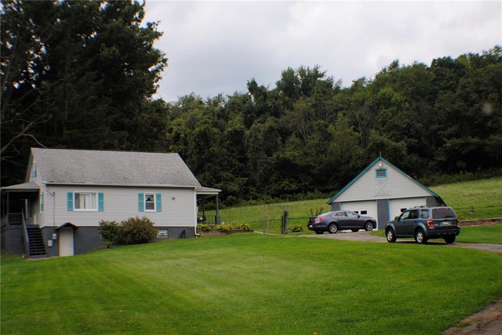 331 Piersol Road Belle Vernon, PA 15012 - Photo 19 of 20 Home sits on 1.4 acres has two detached garage with room above garage for storage. The Driveway is circular