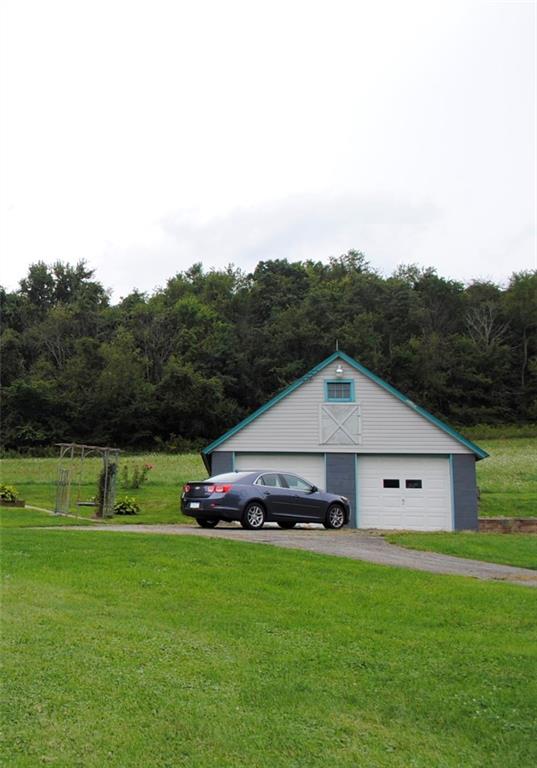 331 Piersol Road Belle Vernon, PA 15012 - Photo 3 of 20 2 Car Garage with cement pad on the side for trailer or boat.
