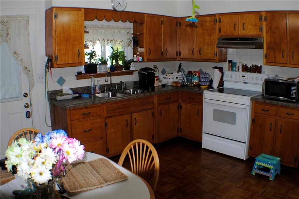 331 Piersol Road Belle Vernon, PA 15012 - Photo 5 of 20 Eat n Kitchen. All Appliances stay. Tile back splash refinished wood cabinets.