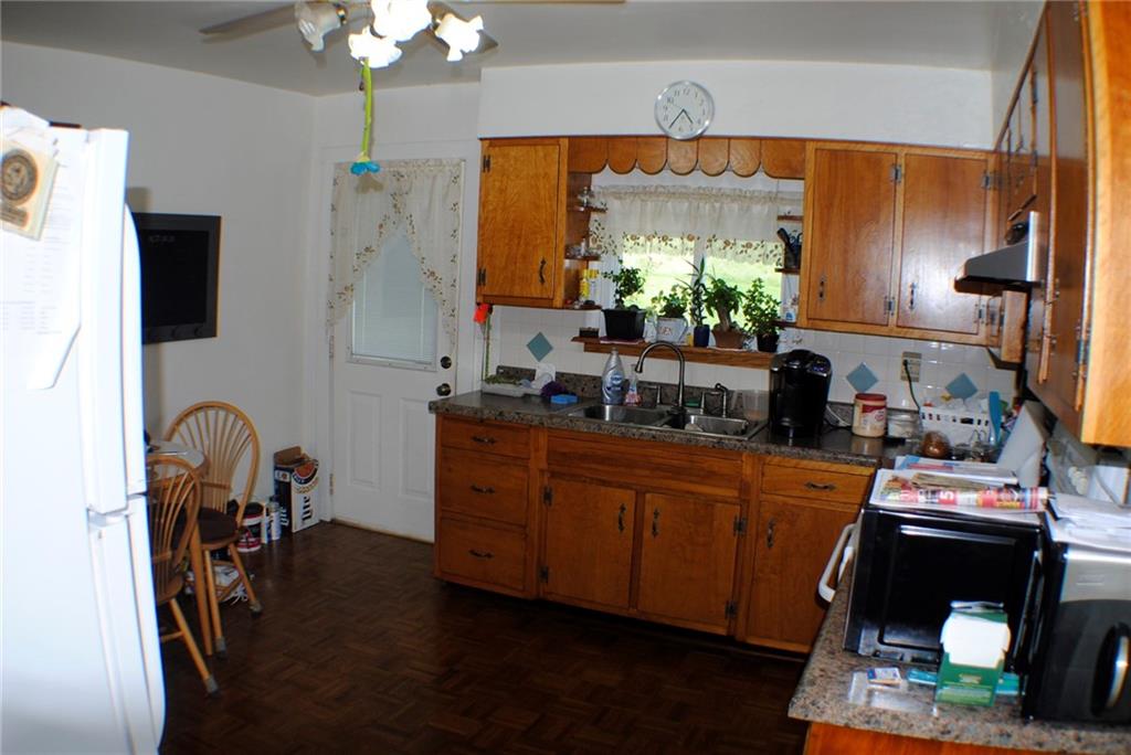 331 Piersol Road Belle Vernon, PA 15012 - Photo 7 of 20 Eat n Kitchen. All Appliances stay. Tile back splash refinished wood cabinets.