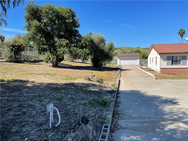 a view of city street with houses