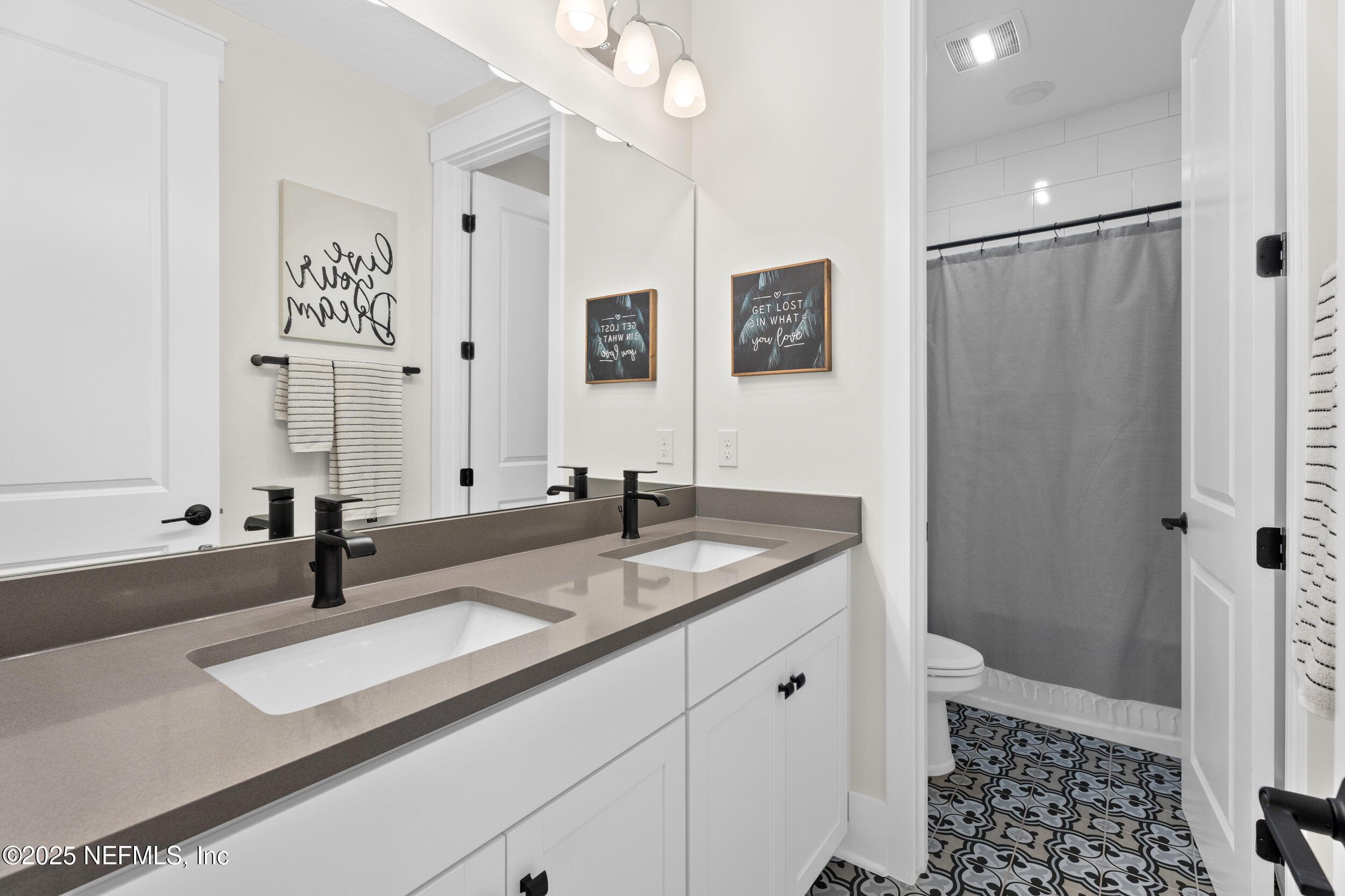 558 Palm Crest Drive Ponte Vedra, FL 32081 - Photo 38 of 83 a bathroom with a sink and a mirror