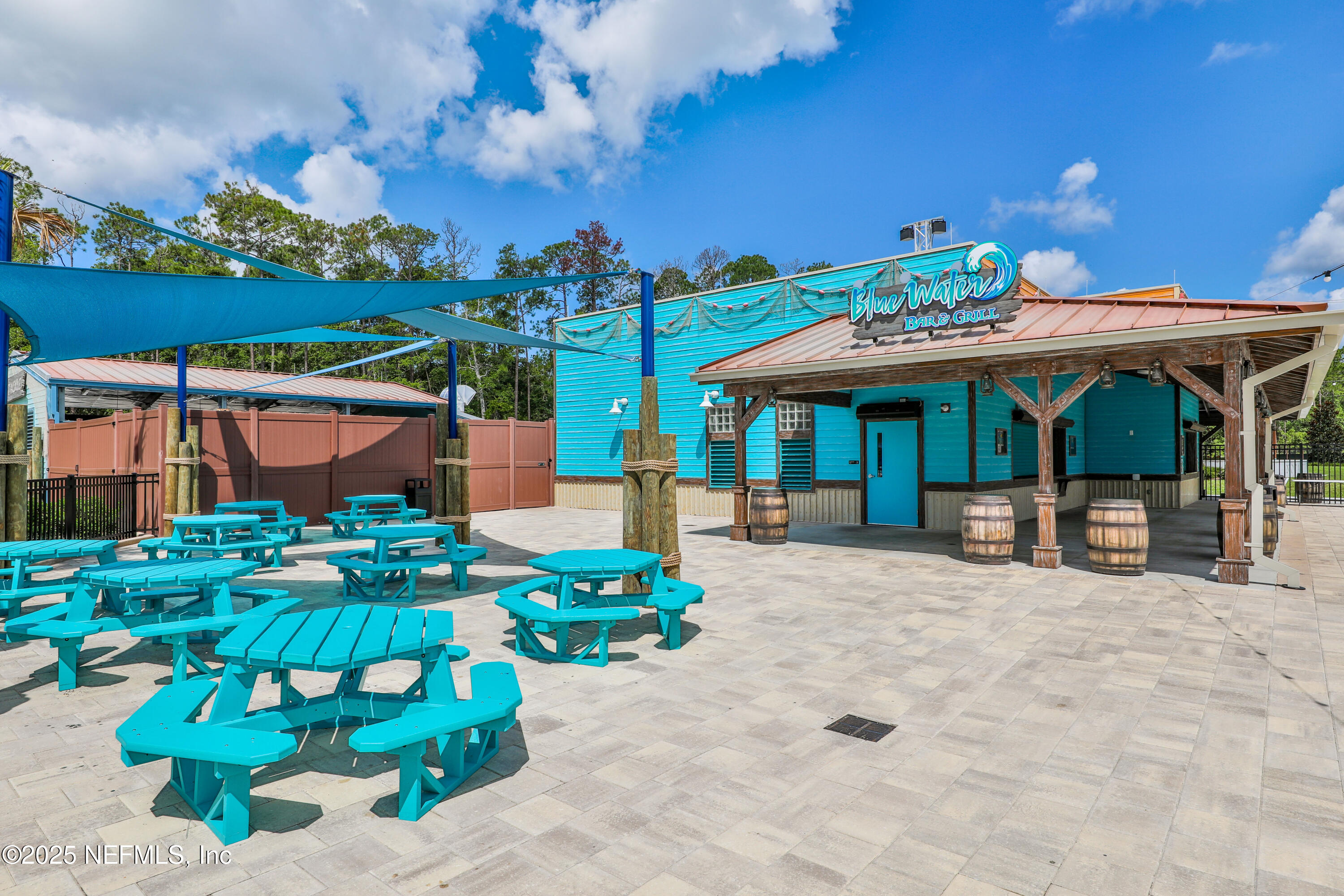558 Palm Crest Drive Ponte Vedra, FL 32081 - Photo 66 of 83 a view of a chairs and tables in the patio