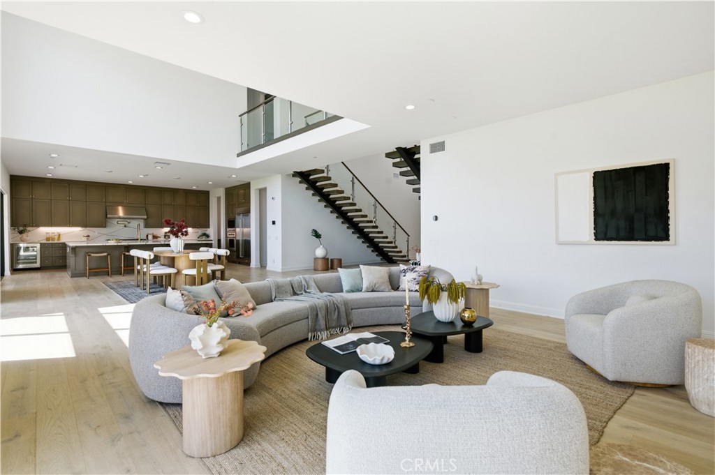 20164 Galway Lane Porter Ranch, CA 91326 - Photo 20 of 48 Open living and dining spaces designed for seamless flow and connection