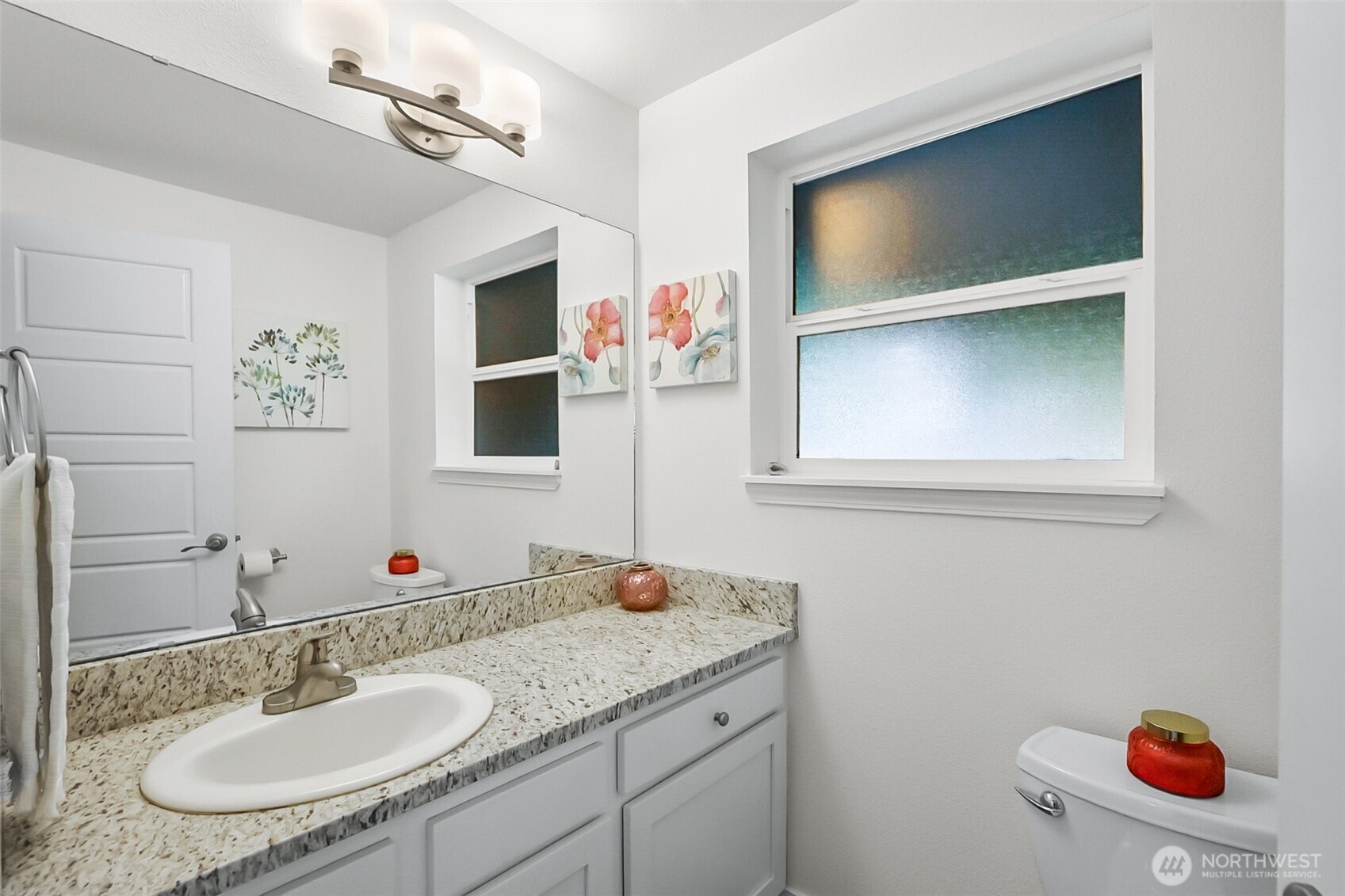 19462 324th Avenue Northeast Duvall, WA 98019 - Photo 17 of 40 a bathroom with a sink and a mirror
