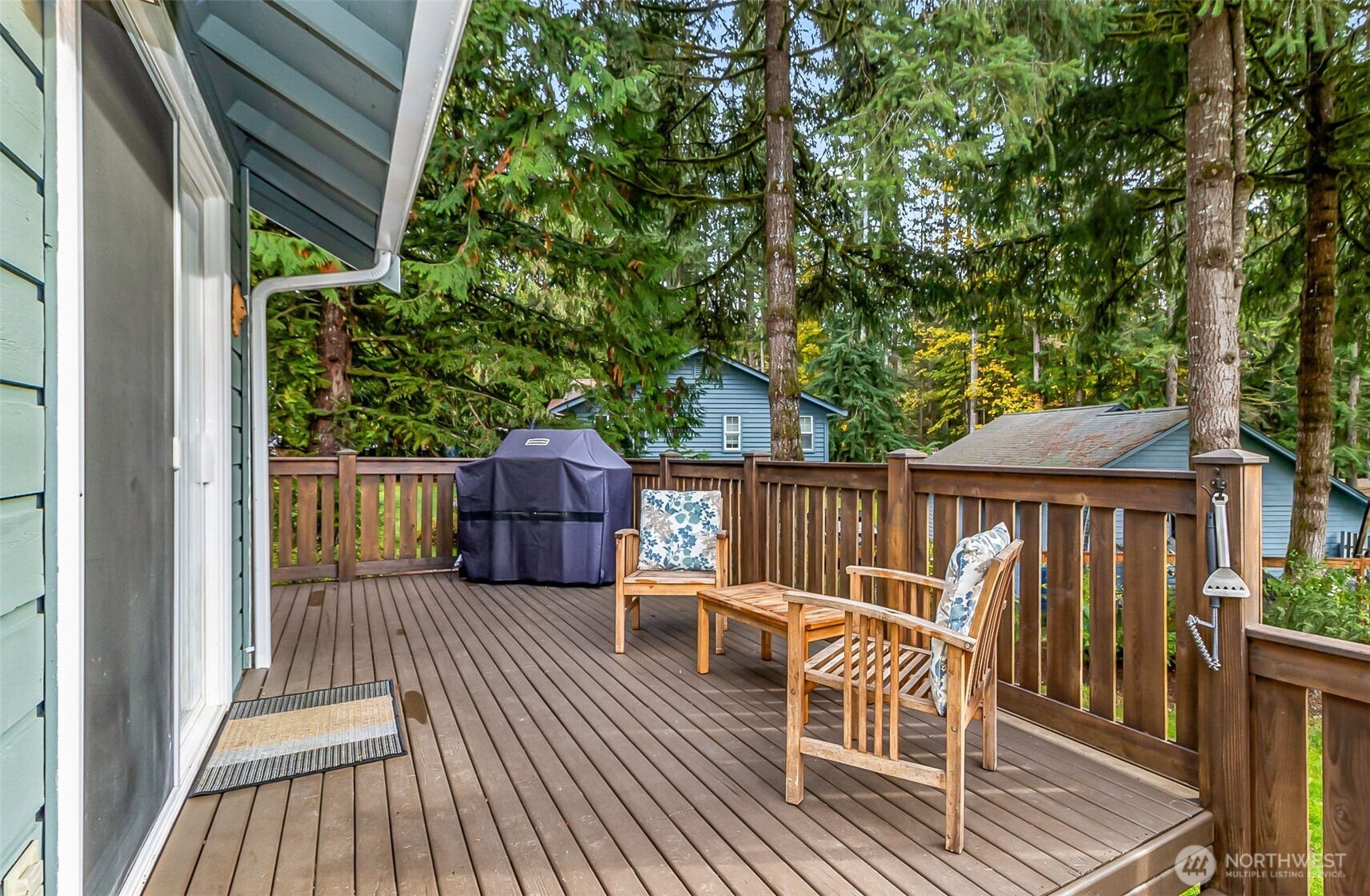 19462 324th Avenue Northeast Duvall, WA 98019 - Photo 26 of 40 a view of a wooden deck with a bench