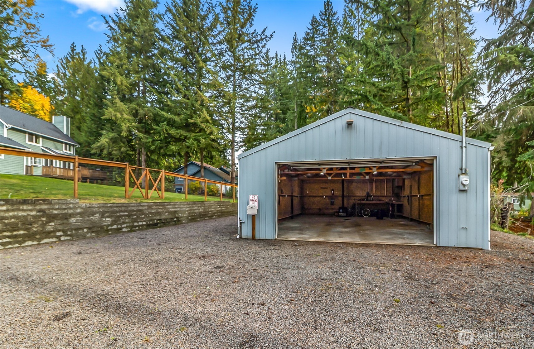 19462 324th Avenue Northeast Duvall, WA 98019 - Photo 33 of 40 a view of a house with a yard and garage