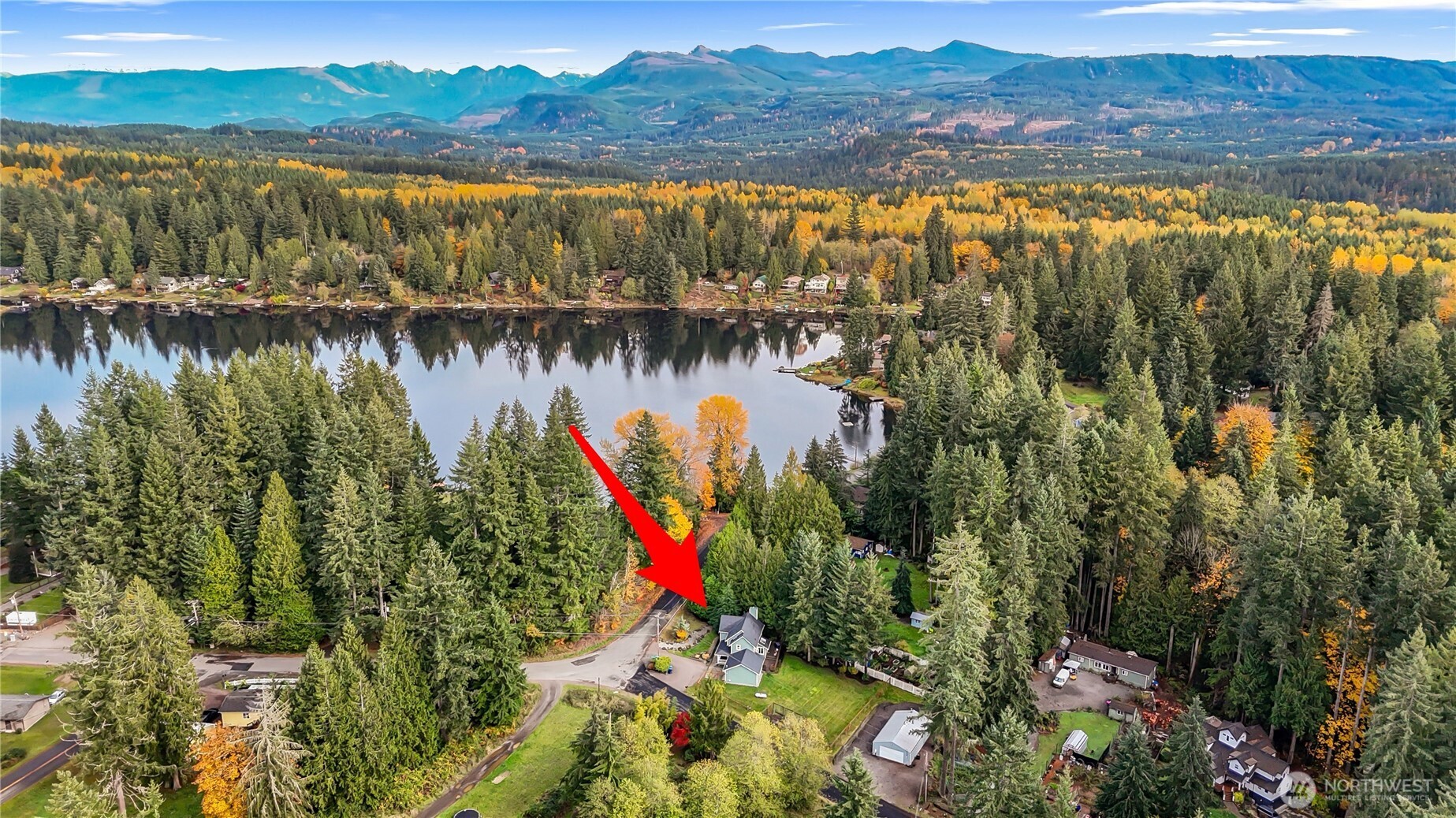 19462 324th Avenue Northeast Duvall, WA 98019 - Photo 39 of 40 a view of a lake with a mountain