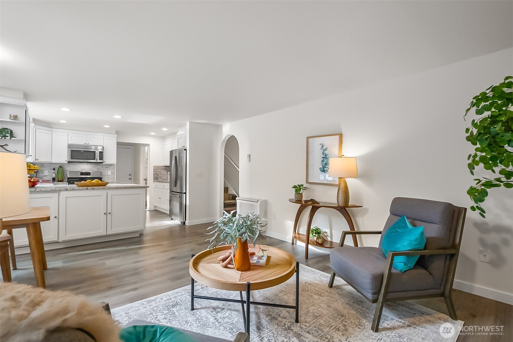 19462 324th Avenue Northeast Duvall, WA 98019 - Photo 10 of 40 a living room with furniture and a potted plant