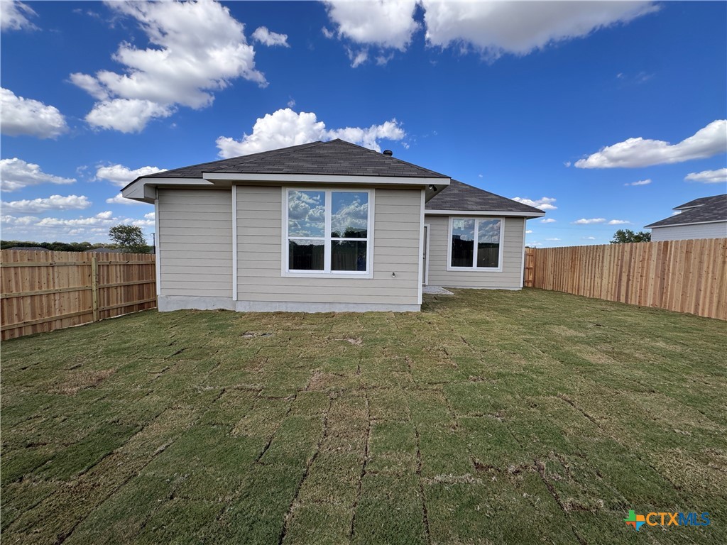 409 University Avenue Troy, TX 76579 - Photo 18 of 20 a front view of a house with a yard