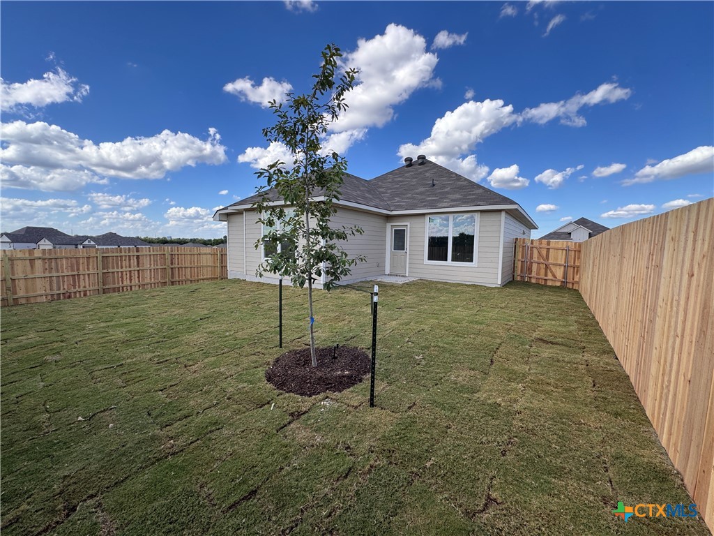 409 University Avenue Troy, TX 76579 - Photo 20 of 20 a front view of a house with garden
