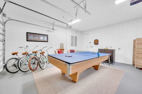 a room with furniture and white walls