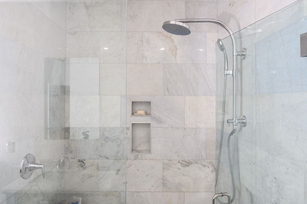 196 Main Street, Unit 196 Groveland, MA 01834 - Photo 16 of 35 a bathroom with a shower