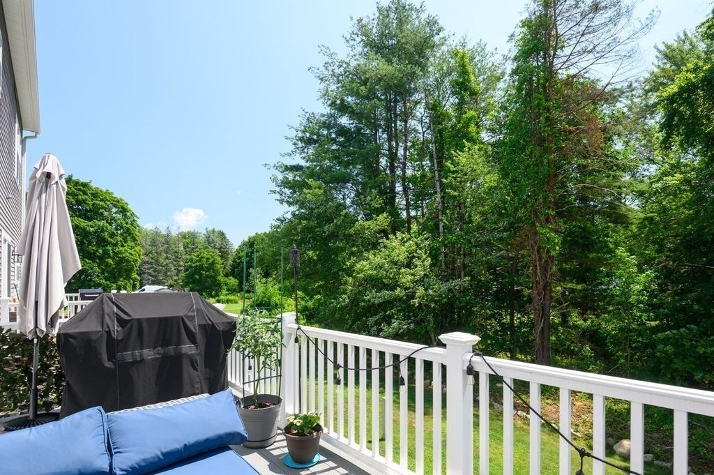 196 Main Street, Unit 196 Groveland, MA 01834 - Photo 27 of 35 a view of a two chairs and table in the balcony