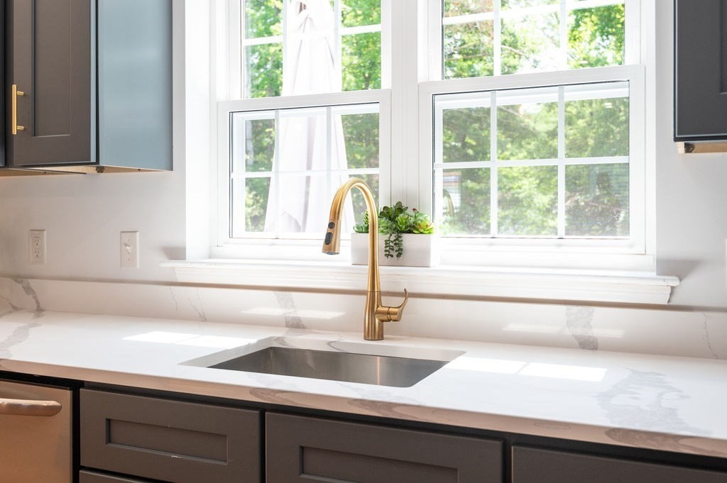 196 Main Street, Unit 196 Groveland, MA 01834 - Photo 3 of 35 a view of a sink and a window