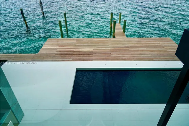 a view of entryway with a table and a chandelier