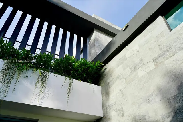 a view of a swimming pool with a balcony