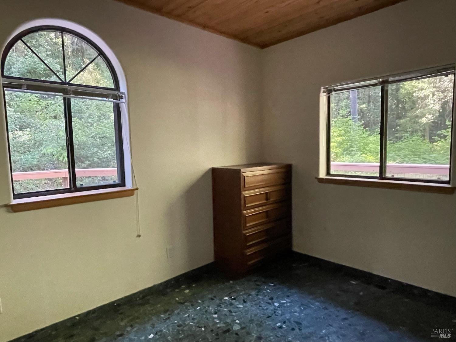 35905 Hauser Bridge Road, Unit J Cazadero, CA 95421 - Photo 23 of 34 an empty room with a window