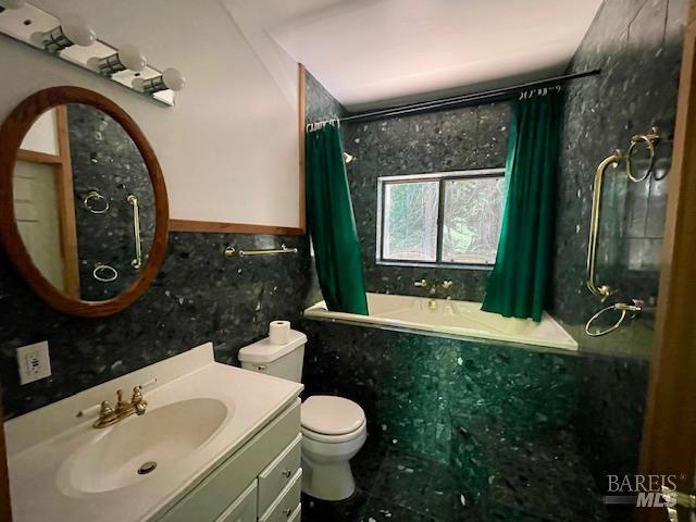 35905 Hauser Bridge Road, Unit J Cazadero, CA 95421 - Photo 24 of 34 a bathroom with a sink and a mirror