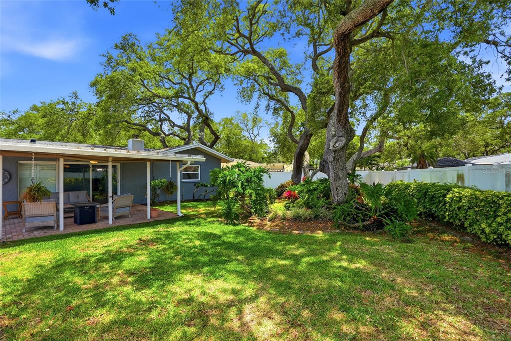 9760 136th Street Seminole, FL 33776 - Photo 36 of 41 front view of a house with a yard