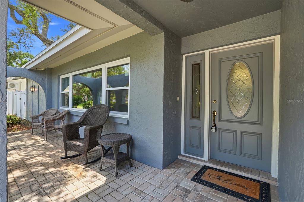 9760 136th Street Seminole, FL 33776 - Photo 38 of 41 a view of a workspace with furniture and a window