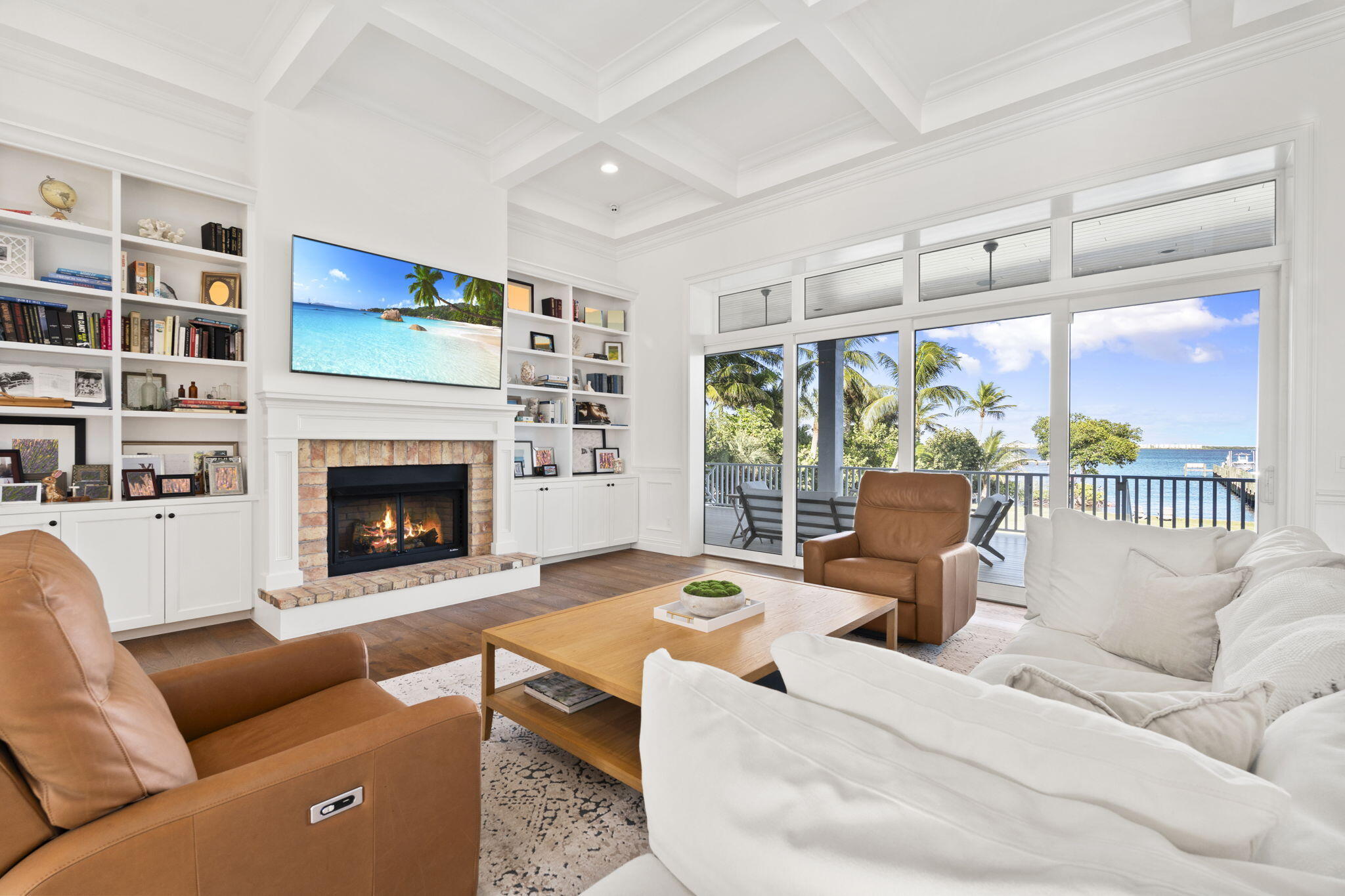 54 South Sewalls Point Road Sewall's Point, FL 34996 - Photo 12 of 68 a living room with furniture large window and fireplace